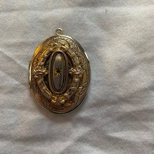 White and yellow gold locket